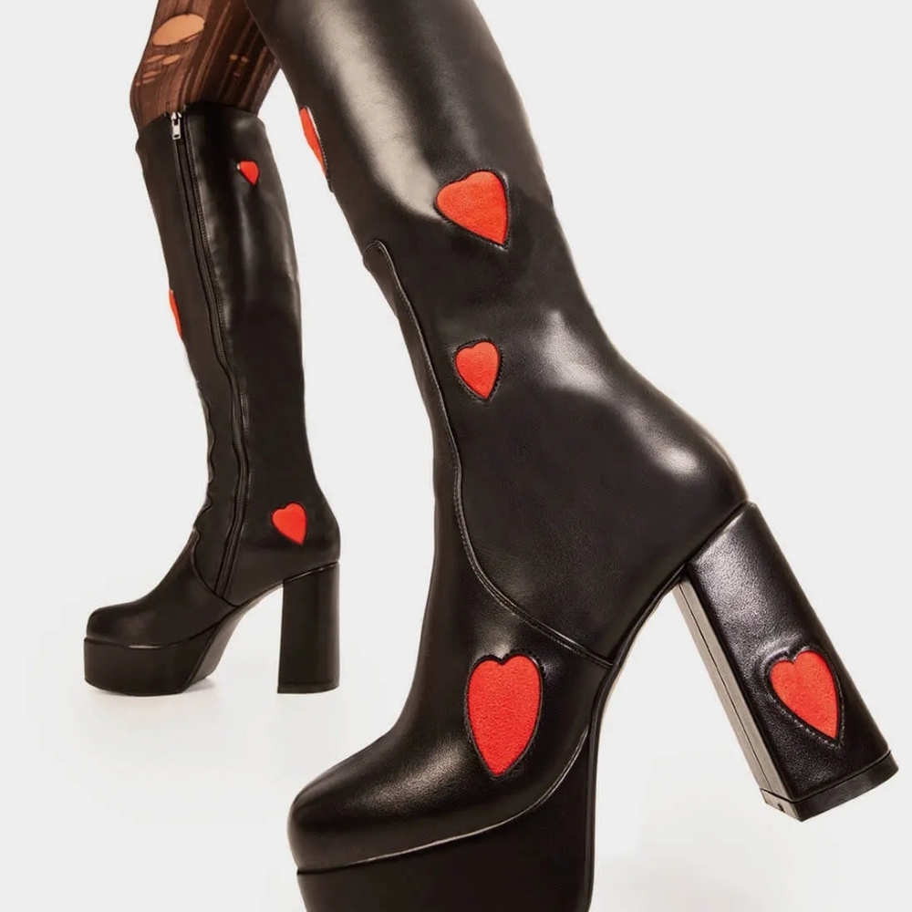 Stylish Black Heeled Boots with Red Heart Accents